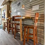 - Aparthotel